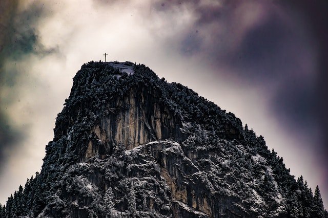 Image of a mountain with cross